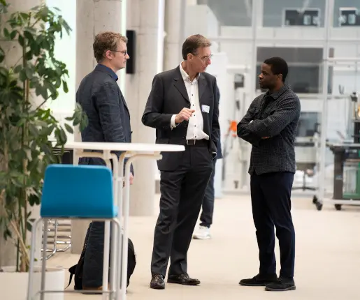 Dr. Erik Blazek, Heinz Kölzer, Darryl Mbolo (v. l. n. r.)